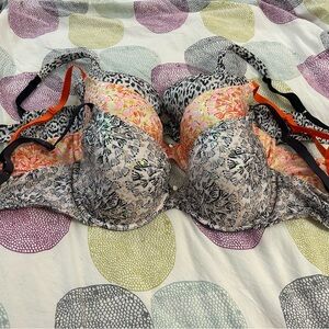 Three gently used Victora’s Secret bras. All sized 34 DD.